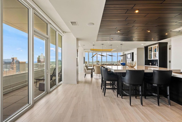 dining room featuring light wood-type flooring