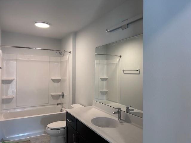 full bathroom featuring tub / shower combination, vanity, and toilet