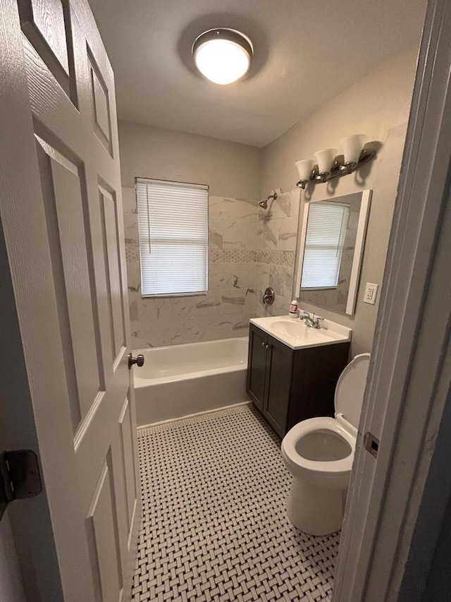 full bathroom with tile patterned floors, vanity, shower / bath combination, and toilet