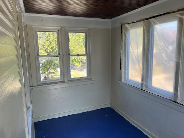 empty room featuring ornamental molding