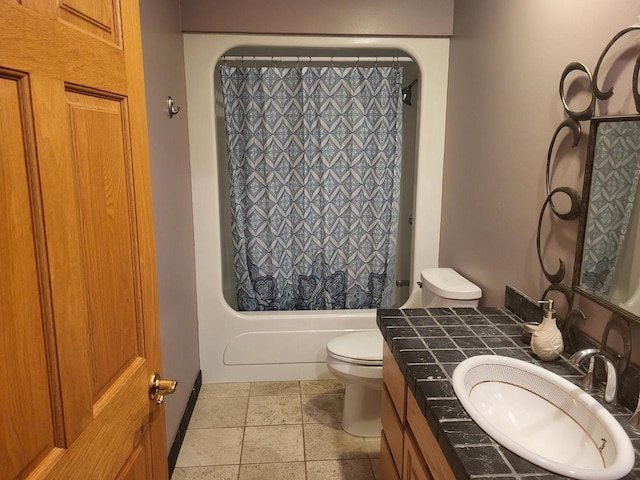 full bathroom featuring tile patterned floors, vanity, toilet, and shower / bathtub combination with curtain