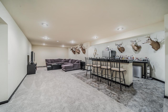 interior space with carpet and indoor bar