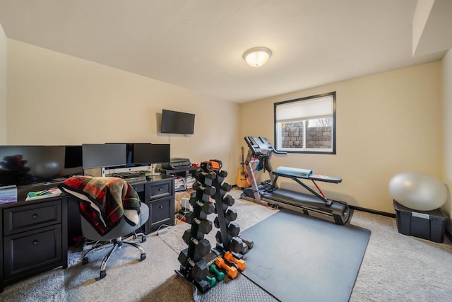 exercise room with carpet flooring