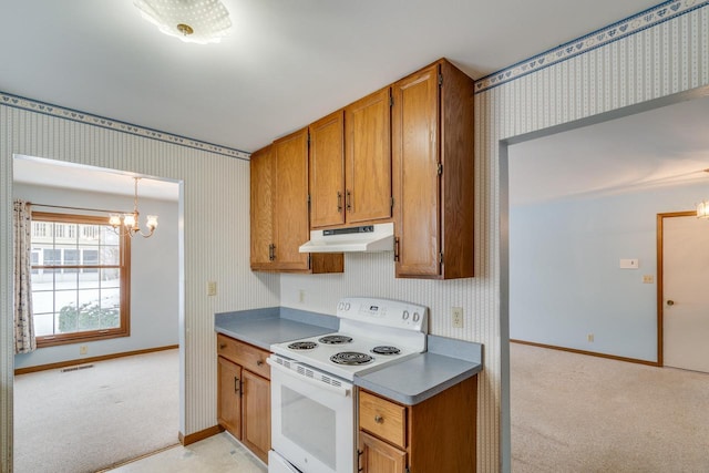 kitchen featuring electric range, light colored carpet, decorative light fixtures, and a notable chandelier