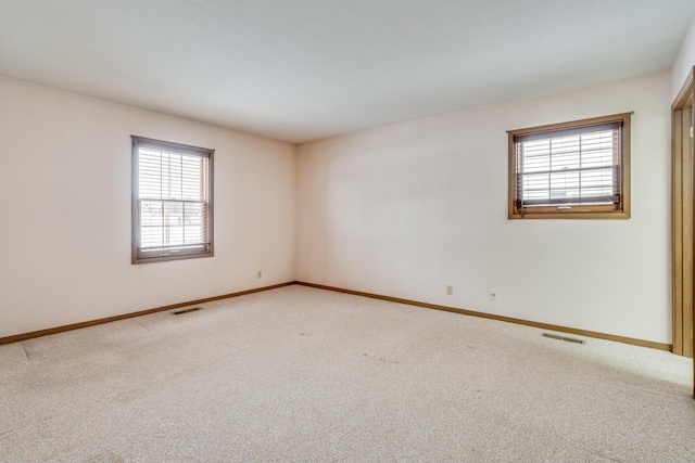 unfurnished room with carpet