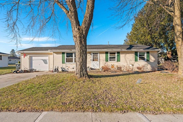 ranch-style house with a front yard and a garage