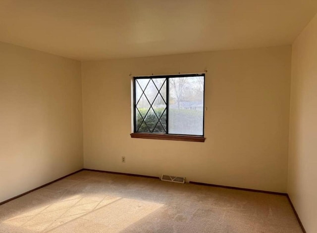 empty room featuring carpet floors