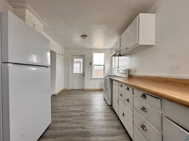 kitchen with light hardwood / wood-style floors, white cabinetry, and white appliances