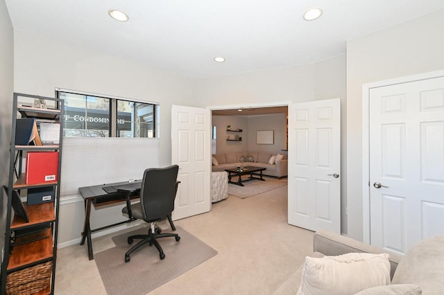 home office featuring light colored carpet