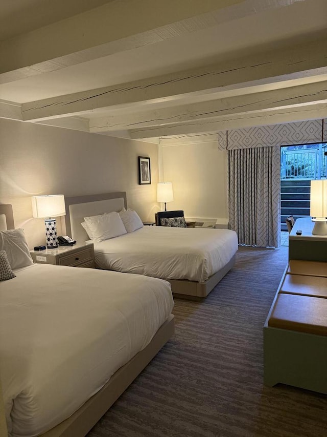 bedroom featuring beam ceiling