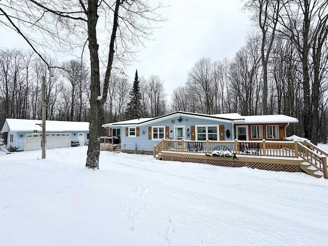 view of front facade with an outdoor structure and a garage