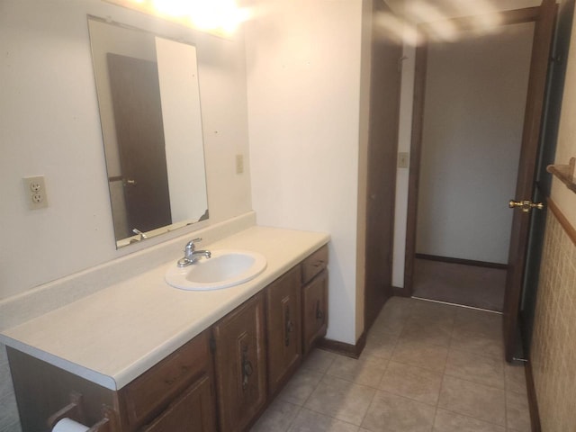 bathroom featuring tile patterned floors and vanity