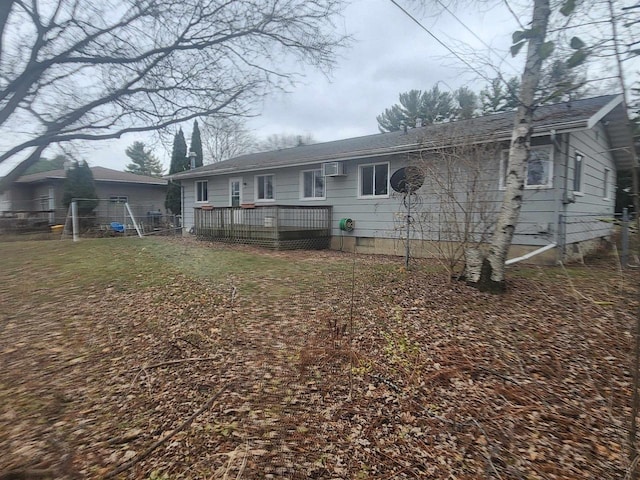 41 E Vista Blvd, Markesan, WI 53946 - rear view of property with a wooden deck and a shingled roof