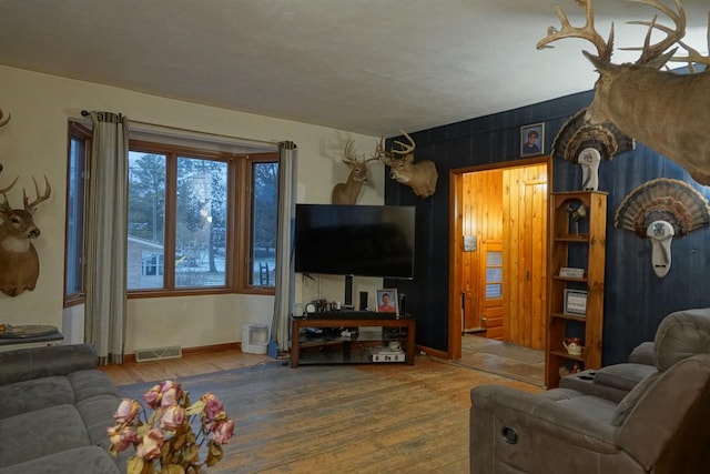 living room with wood-type flooring