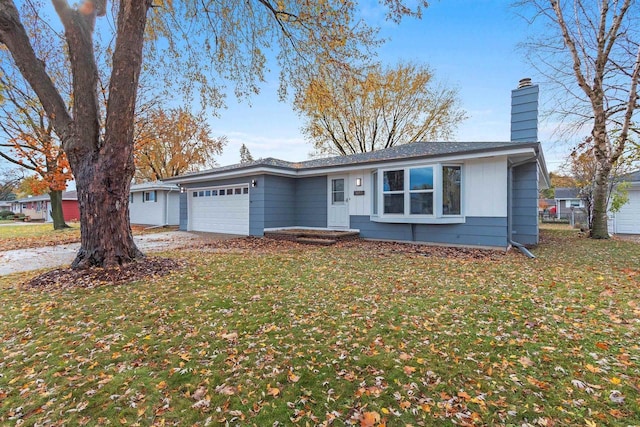 ranch-style house with a front lawn and a garage