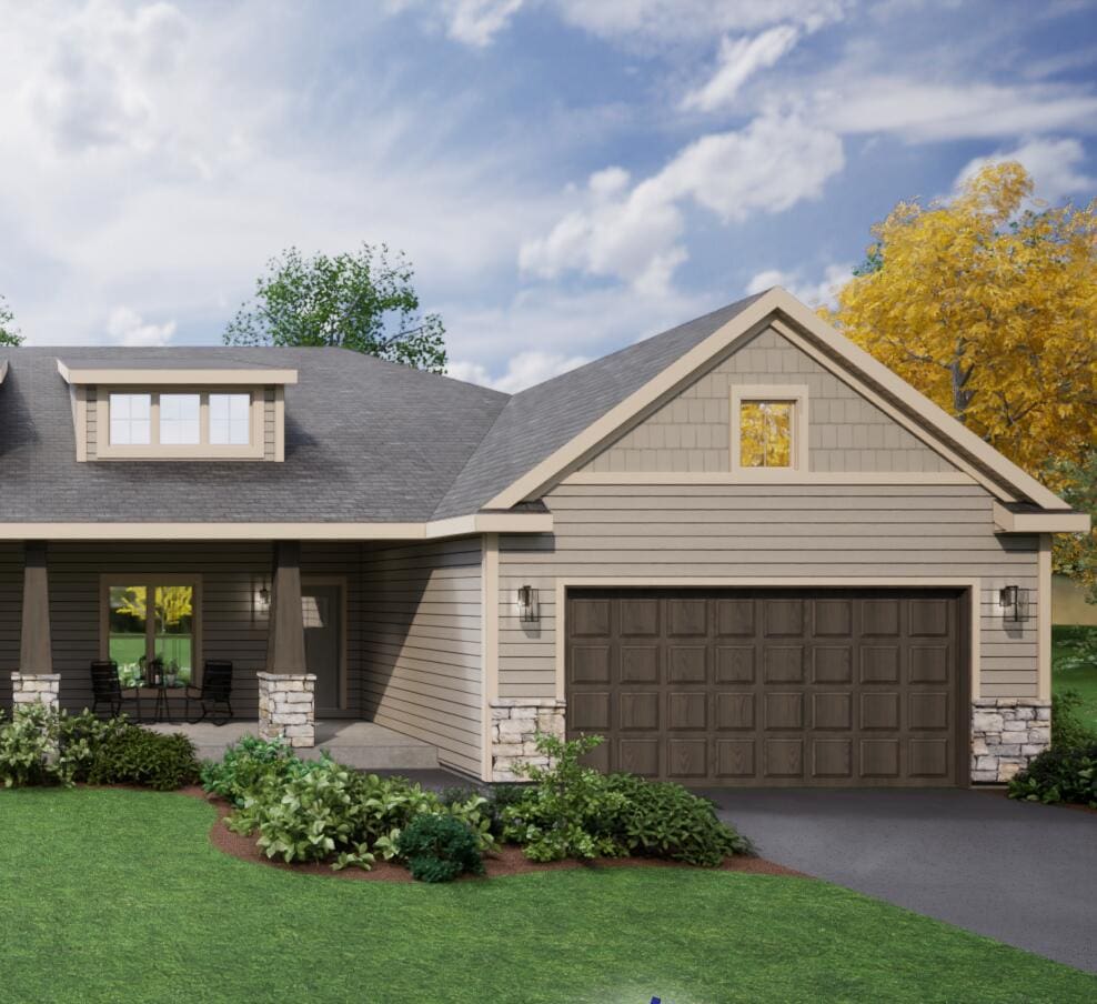 8023 S Quincy Ave Unit 56, Oak Creek, WI 53154 - craftsman inspired home with stone siding, a front lawn, a garage, driveway, and covered porch