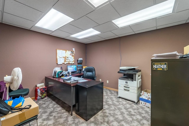 office space featuring carpet flooring and a paneled ceiling