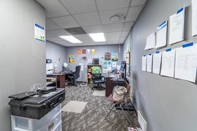 office space featuring a drop ceiling and carpet