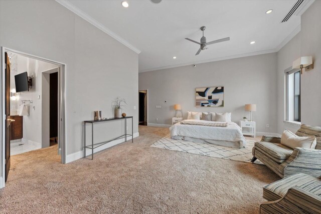 carpeted bedroom featuring ceiling fan and ornamental molding