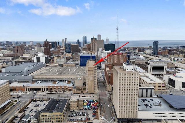 property's view of city featuring a water view