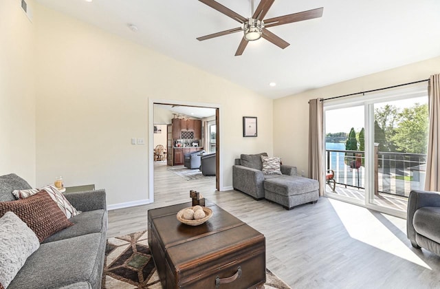 7134 N Tichigan Rd, Waterford, WI 53185 - living area with ceiling fan, light wood-style floors, baseboards, recessed lighting, and high vaulted ceiling