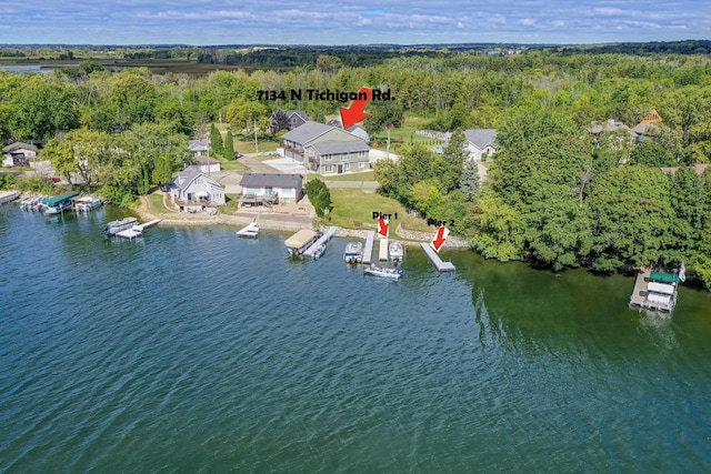 7134 N Tichigan Rd, Waterford, WI 53185 - aerial overview of property's location featuring a large body of water and a forest