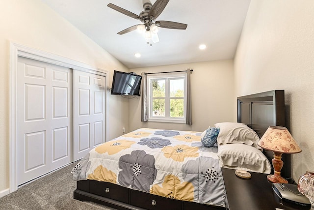 7134 N Tichigan Rd, Waterford, WI 53185 - carpeted bedroom with vaulted ceiling, a closet, and a ceiling fan