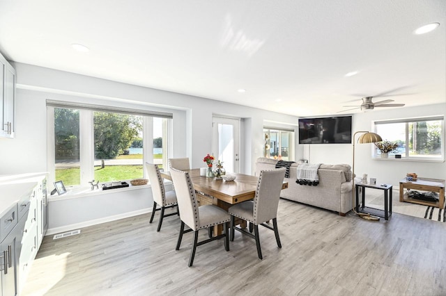 7134 N Tichigan Rd, Waterford, WI 53185 - dining space featuring plenty of natural light, light wood-style flooring, ceiling fan, recessed lighting, and baseboards
