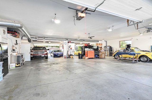 7134 N Tichigan Rd, Waterford, WI 53185 - garage with a garage door opener