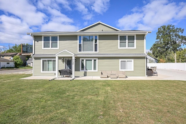7134 N Tichigan Rd, Waterford, WI 53185 - back of house with an outdoor hangout area and a patio