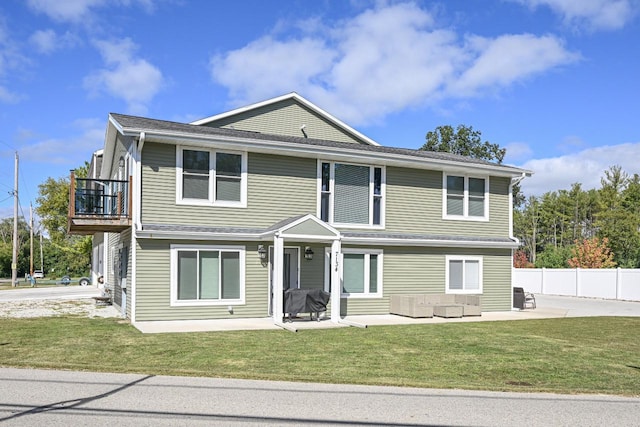7134 N Tichigan Rd, Waterford, WI 53185 - traditional home with a patio area and a balcony