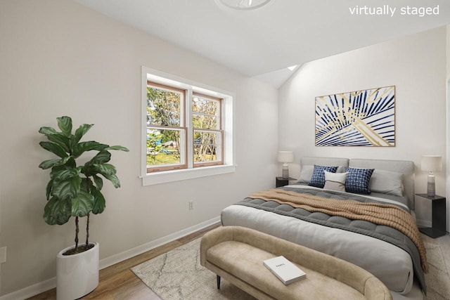 bedroom featuring hardwood / wood-style floors