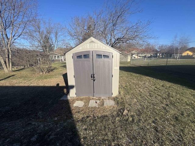 view of outdoor structure with a lawn