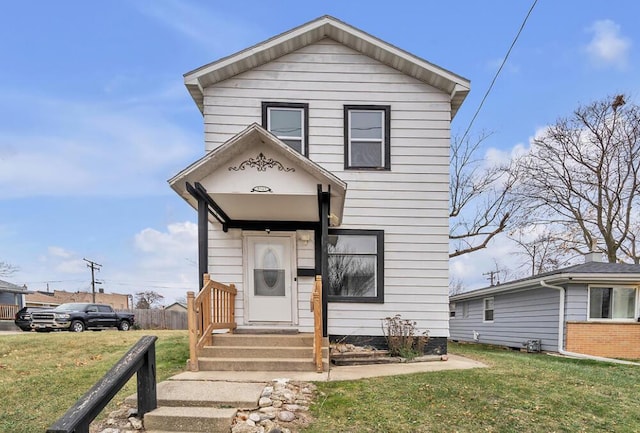 view of front facade with a front yard