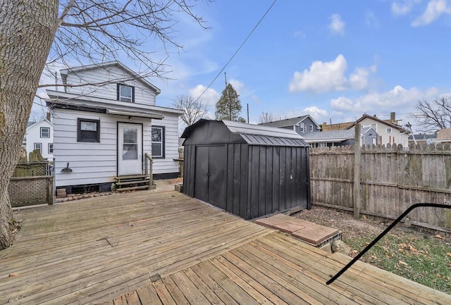 deck featuring a storage unit