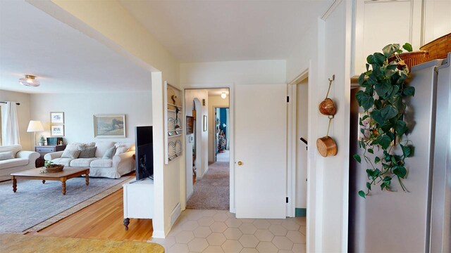 hallway with light wood-type flooring