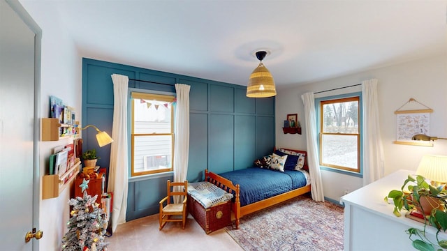 bedroom with light carpet