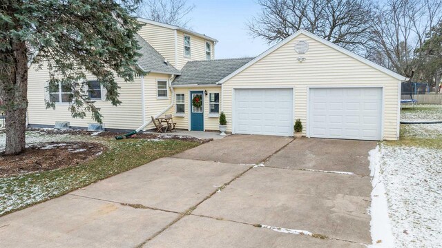 view of front of property with a garage