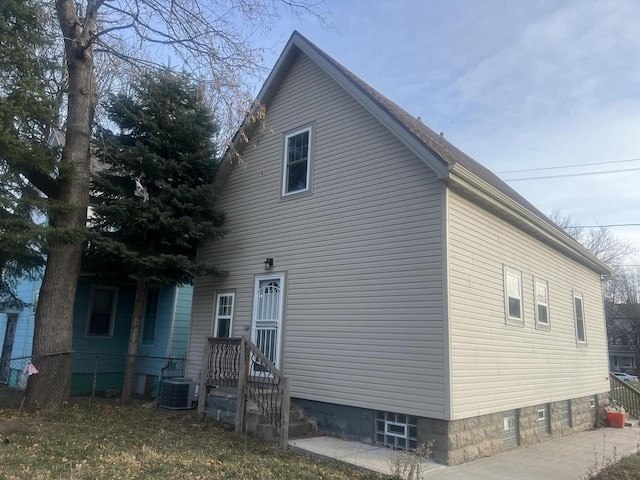 2757 N 11th Ln, Milwaukee, WI 53206 - view of side of home with a central AC unit