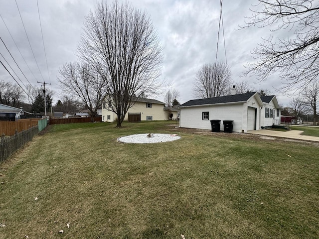 view of yard with a garage