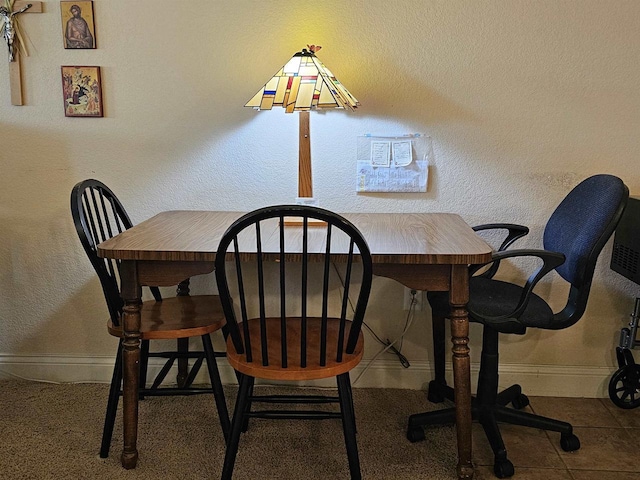 dining area with tile patterned floors