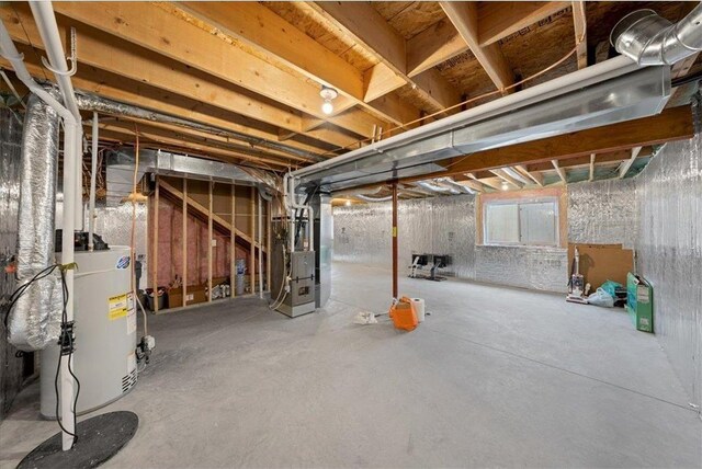 basement with gas water heater and heating unit