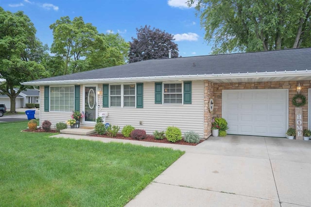 single story home featuring a garage and a front yard