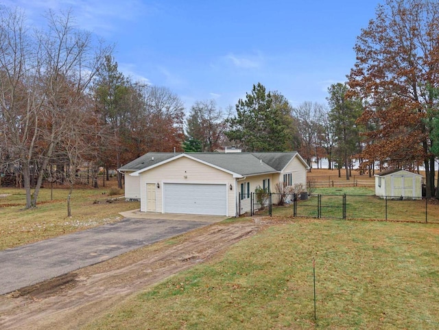 view of front of home with a garage and a front lawn