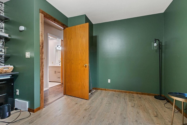 bedroom featuring light hardwood / wood-style floors