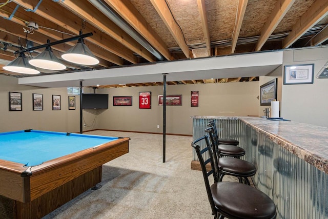 rec room with carpet floors, pool table, and bar area