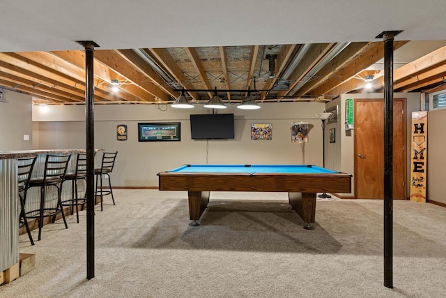 recreation room featuring carpet flooring, indoor bar, and pool table