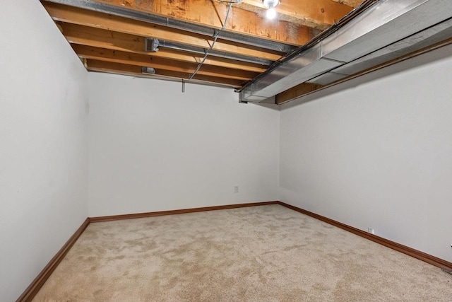 basement with carpet flooring