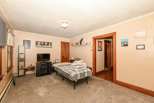 bedroom featuring carpet, crown molding, and a baseboard radiator