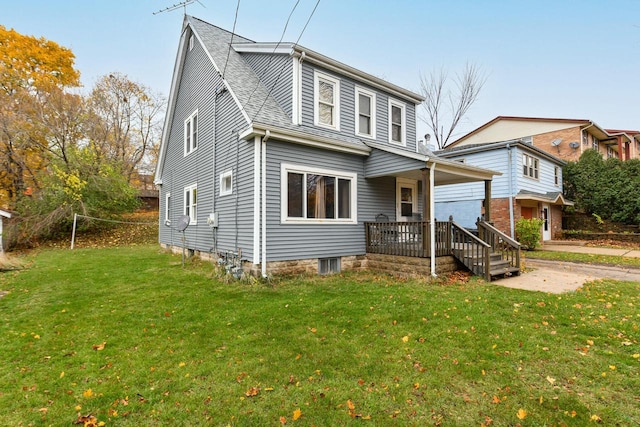 view of property with a porch and a front yard